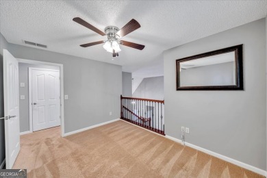 Welcome to this beautifully updated home nestled in the highly on Summergrove Golf Club in Georgia - for sale on GolfHomes.com, golf home, golf lot