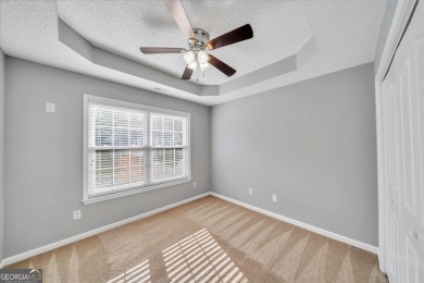 Welcome to this beautifully updated home nestled in the highly on Summergrove Golf Club in Georgia - for sale on GolfHomes.com, golf home, golf lot