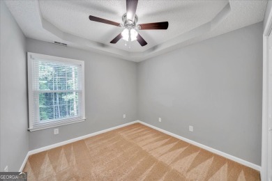 Welcome to this beautifully updated home nestled in the highly on Summergrove Golf Club in Georgia - for sale on GolfHomes.com, golf home, golf lot