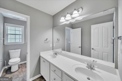 Welcome to this beautifully updated home nestled in the highly on Summergrove Golf Club in Georgia - for sale on GolfHomes.com, golf home, golf lot