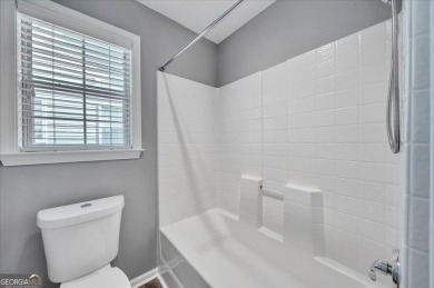 Welcome to this beautifully updated home nestled in the highly on Summergrove Golf Club in Georgia - for sale on GolfHomes.com, golf home, golf lot