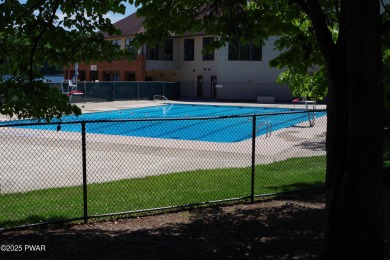 Featureing a Contemporary Poconos Retreat with In-Law Suite & on The Hideout Golf in Pennsylvania - for sale on GolfHomes.com, golf home, golf lot