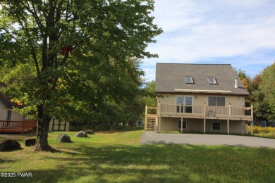 Featureing a Contemporary Poconos Retreat with In-Law Suite & on The Hideout Golf in Pennsylvania - for sale on GolfHomes.com, golf home, golf lot