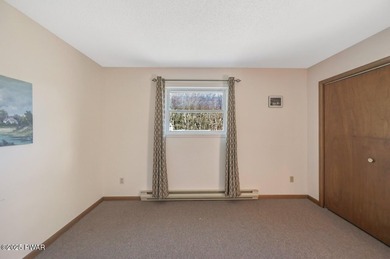 Contemporary Retreat with In-Law Suite & Premier Amenities in on The Hideout Golf in Pennsylvania - for sale on GolfHomes.com, golf home, golf lot