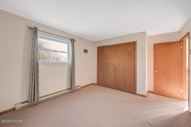 Contemporary Retreat with In-Law Suite & Premier Amenities in on The Hideout Golf in Pennsylvania - for sale on GolfHomes.com, golf home, golf lot