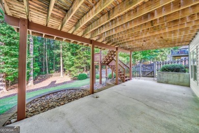 Welcome to this beautifully updated home nestled in the highly on Summergrove Golf Club in Georgia - for sale on GolfHomes.com, golf home, golf lot