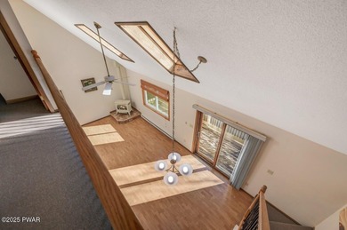 Contemporary Retreat with In-Law Suite & Premier Amenities in on The Hideout Golf in Pennsylvania - for sale on GolfHomes.com, golf home, golf lot