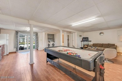 Contemporary Retreat with In-Law Suite & Premier Amenities in on The Hideout Golf in Pennsylvania - for sale on GolfHomes.com, golf home, golf lot