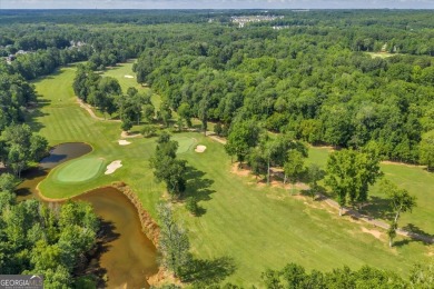 Welcome to this beautifully updated home nestled in the highly on Summergrove Golf Club in Georgia - for sale on GolfHomes.com, golf home, golf lot