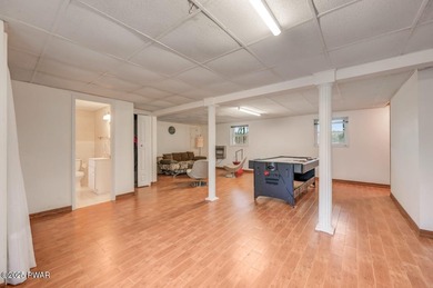 Contemporary Retreat with In-Law Suite & Premier Amenities in on The Hideout Golf in Pennsylvania - for sale on GolfHomes.com, golf home, golf lot