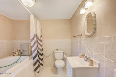 Contemporary Retreat with In-Law Suite & Premier Amenities in on The Hideout Golf in Pennsylvania - for sale on GolfHomes.com, golf home, golf lot