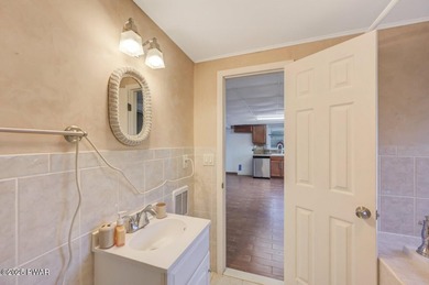 Contemporary Retreat with In-Law Suite & Premier Amenities in on The Hideout Golf in Pennsylvania - for sale on GolfHomes.com, golf home, golf lot