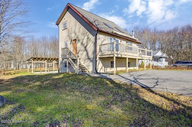 Contemporary Retreat with In-Law Suite & Premier Amenities in on The Hideout Golf in Pennsylvania - for sale on GolfHomes.com, golf home, golf lot