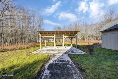 Contemporary Retreat with In-Law Suite & Premier Amenities in on The Hideout Golf in Pennsylvania - for sale on GolfHomes.com, golf home, golf lot