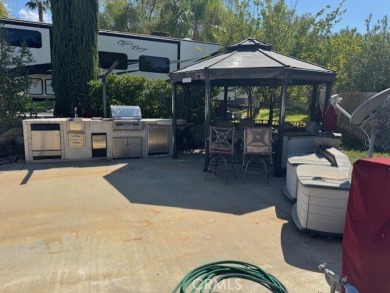 Come and enjoy this lot with privacy wall and hedges, built-In on Rancho California RV Resort in California - for sale on GolfHomes.com, golf home, golf lot