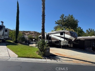 Come and enjoy this lot with privacy wall and hedges, built-In on Rancho California RV Resort in California - for sale on GolfHomes.com, golf home, golf lot