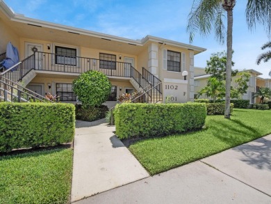 Rarely Available First Floor End Unit with views of the 7th hole on The Golf Club of Jupiter in Florida - for sale on GolfHomes.com, golf home, golf lot
