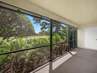 Rarely Available First Floor End Unit with views of the 7th hole on The Golf Club of Jupiter in Florida - for sale on GolfHomes.com, golf home, golf lot
