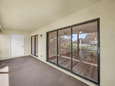 Rarely Available First Floor End Unit with views of the 7th hole on The Golf Club of Jupiter in Florida - for sale on GolfHomes.com, golf home, golf lot
