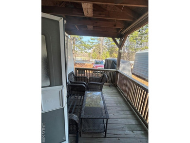 Escape to relaxation with this cozy camper retreat! Nestled in a on River Ridge Golf Club in Virginia - for sale on GolfHomes.com, golf home, golf lot