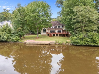 Nestled on nearly half an acre along the 2 mile long Lochmere on Lochmere Golf Club in North Carolina - for sale on GolfHomes.com, golf home, golf lot
