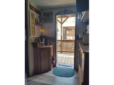 Escape to relaxation with this cozy camper retreat! Nestled in a on River Ridge Golf Club in Virginia - for sale on GolfHomes.com, golf home, golf lot