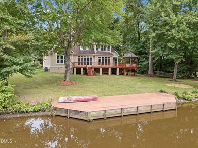 Nestled on nearly half an acre along the 2 mile long Lochmere on Lochmere Golf Club in North Carolina - for sale on GolfHomes.com, golf home, golf lot