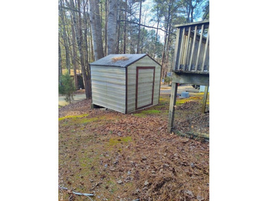 Escape to relaxation with this cozy camper retreat! Nestled in a on River Ridge Golf Club in Virginia - for sale on GolfHomes.com, golf home, golf lot