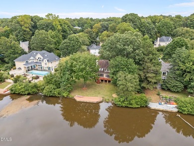 Nestled on nearly half an acre along the 2 mile long Lochmere on Lochmere Golf Club in North Carolina - for sale on GolfHomes.com, golf home, golf lot
