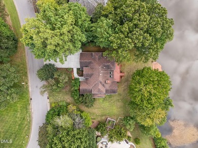 Nestled on nearly half an acre along the 2 mile long Lochmere on Lochmere Golf Club in North Carolina - for sale on GolfHomes.com, golf home, golf lot