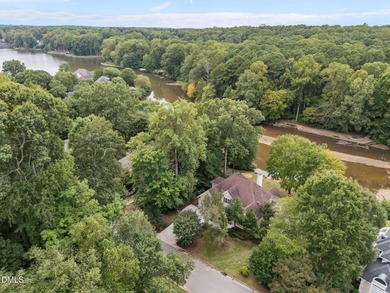 Nestled on nearly half an acre along the 2 mile long Lochmere on Lochmere Golf Club in North Carolina - for sale on GolfHomes.com, golf home, golf lot