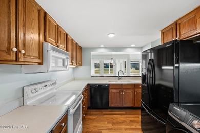 Charming Two-Story Townhome in Olde Point Villas This on Olde Point Golf and Country Club in North Carolina - for sale on GolfHomes.com, golf home, golf lot