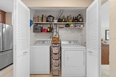 Welcome home to Mediterranean Manor, an idyllic waterfront on The Dunedin Country Club in Florida - for sale on GolfHomes.com, golf home, golf lot