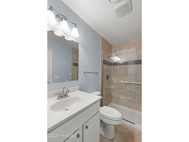 Charming Two-Story Townhome in Olde Point Villas This on Olde Point Golf and Country Club in North Carolina - for sale on GolfHomes.com, golf home, golf lot