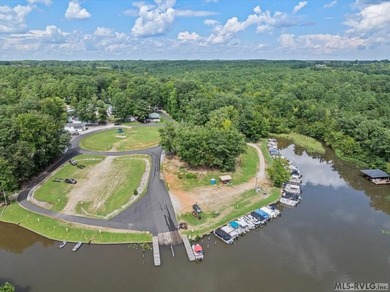 Escape to relaxation with this cozy camper retreat! Nestled in a on River Ridge Golf Club in Virginia - for sale on GolfHomes.com, golf home, golf lot