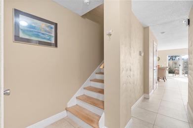 Welcome home to Mediterranean Manor, an idyllic waterfront on The Dunedin Country Club in Florida - for sale on GolfHomes.com, golf home, golf lot