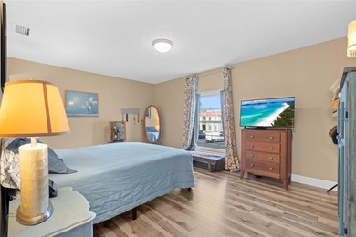 Welcome home to Mediterranean Manor, an idyllic waterfront on The Dunedin Country Club in Florida - for sale on GolfHomes.com, golf home, golf lot