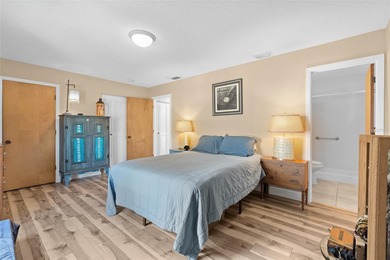 Welcome home to Mediterranean Manor, an idyllic waterfront on The Dunedin Country Club in Florida - for sale on GolfHomes.com, golf home, golf lot