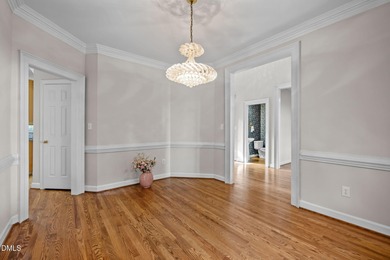 Nestled on nearly half an acre along the 2 mile long Lochmere on Lochmere Golf Club in North Carolina - for sale on GolfHomes.com, golf home, golf lot