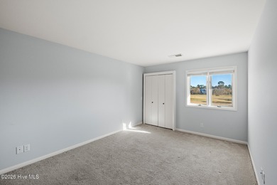 Charming Two-Story Townhome in Olde Point Villas This on Olde Point Golf and Country Club in North Carolina - for sale on GolfHomes.com, golf home, golf lot