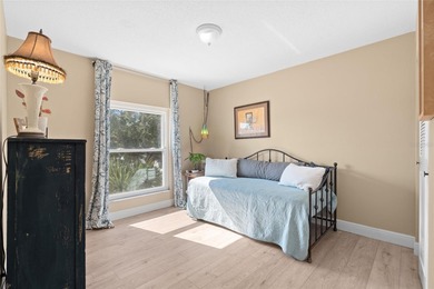 Welcome home to Mediterranean Manor, an idyllic waterfront on The Dunedin Country Club in Florida - for sale on GolfHomes.com, golf home, golf lot