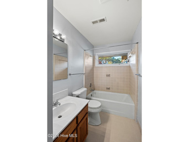 Charming Two-Story Townhome in Olde Point Villas This on Olde Point Golf and Country Club in North Carolina - for sale on GolfHomes.com, golf home, golf lot