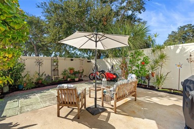 Welcome home to Mediterranean Manor, an idyllic waterfront on The Dunedin Country Club in Florida - for sale on GolfHomes.com, golf home, golf lot