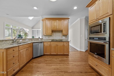 Nestled on nearly half an acre along the 2 mile long Lochmere on Lochmere Golf Club in North Carolina - for sale on GolfHomes.com, golf home, golf lot