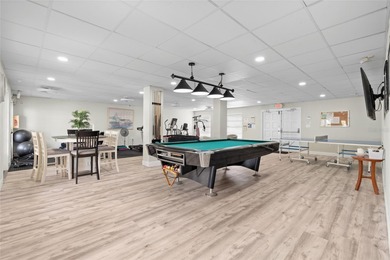 Welcome home to Mediterranean Manor, an idyllic waterfront on The Dunedin Country Club in Florida - for sale on GolfHomes.com, golf home, golf lot