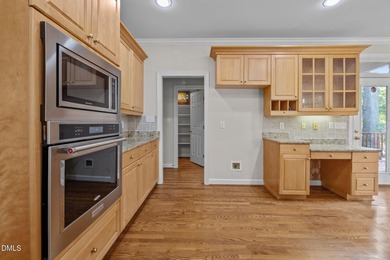 Nestled on nearly half an acre along the 2 mile long Lochmere on Lochmere Golf Club in North Carolina - for sale on GolfHomes.com, golf home, golf lot