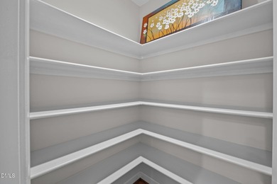 Nestled on nearly half an acre along the 2 mile long Lochmere on Lochmere Golf Club in North Carolina - for sale on GolfHomes.com, golf home, golf lot