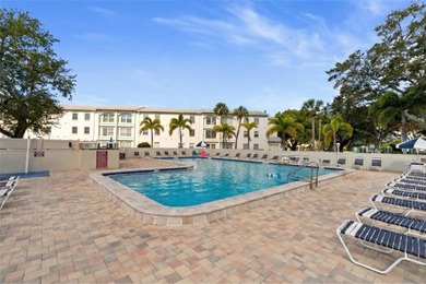 Welcome home to Mediterranean Manor, an idyllic waterfront on The Dunedin Country Club in Florida - for sale on GolfHomes.com, golf home, golf lot