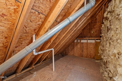 Nestled on nearly half an acre along the 2 mile long Lochmere on Lochmere Golf Club in North Carolina - for sale on GolfHomes.com, golf home, golf lot