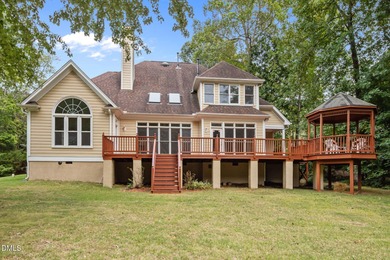 Nestled on nearly half an acre along the 2 mile long Lochmere on Lochmere Golf Club in North Carolina - for sale on GolfHomes.com, golf home, golf lot